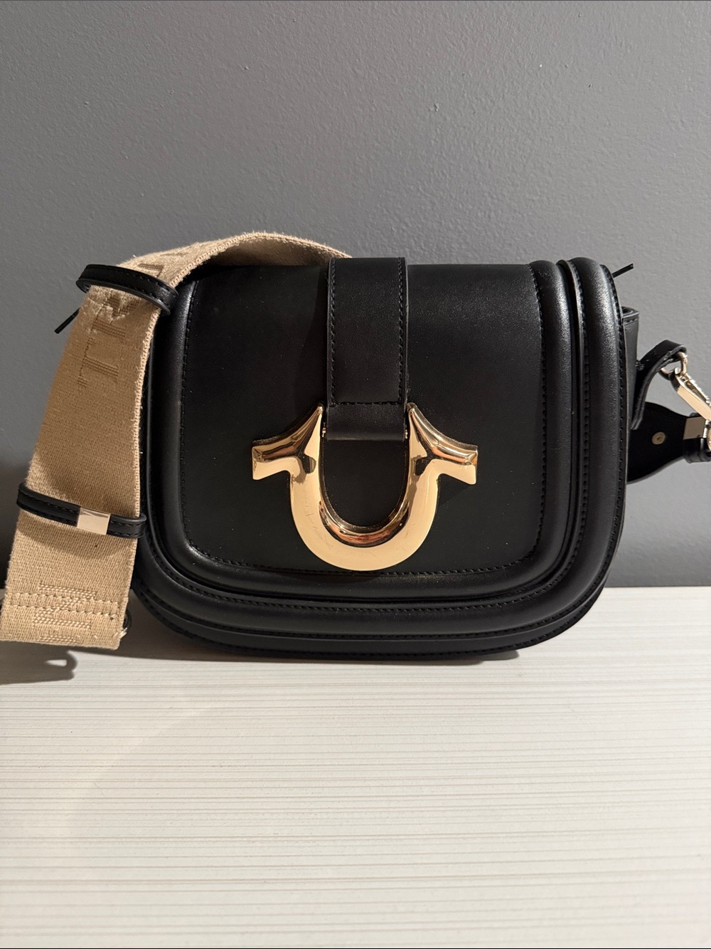 True religion shoulder bag.